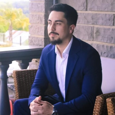 Professional portrait of Roberto, looking strategic and focused